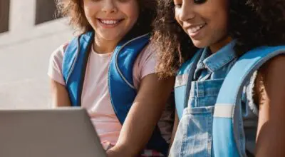 children using AI on computer